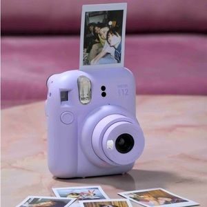 purple instax camera, comes with the camera bag.